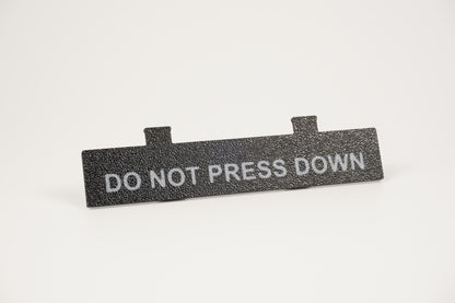 Do Not Press Down black Ninten-Drawer faceplate