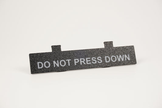 Do Not Press Down black Ninten-Drawer faceplate